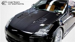 Picture of Carbon Creations 100494 2003-2006 Nissan 350Z Z33 Carbon Creations Dritech JGTC Hood - 1 Piece
