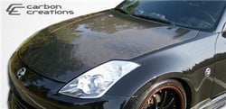 Picture of Carbon Creations 104775 2007-2008 Nissan 350Z Z33 Carbon Creations Dritech OEM Look Hood - 1 Piece